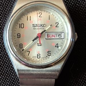 Seiko Silver Watch with Red Accents